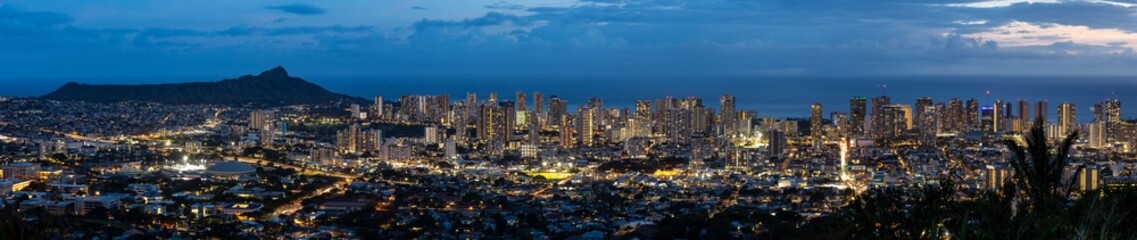 Fototapeta na wymiar Honolulu skyline at blue hour with city lights
