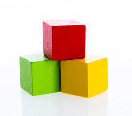 Three wooden blocks on white background