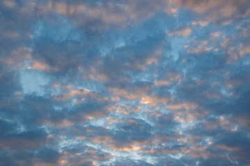 Majestic clouds burning by sunrise. Sky background