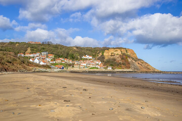 The jumble of white cottages with pantile roofs that make up the seaside village of Runswick Bay in...