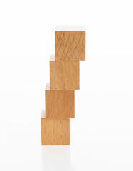 A stack of wooden blocks on white background