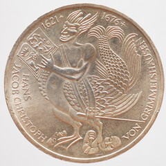 Germany - circa 1976: a 5 DM coin of Germany showing a dragon symbol in memory of the author Hans Jakob Christoffel von Grimmelshausen