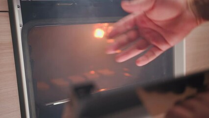 Unrecognizable Man Opens an Oven Full of Smoke in the Kitchen. Male Bachelor Ruined Dinner with Burnt Food. Bad Cook. 