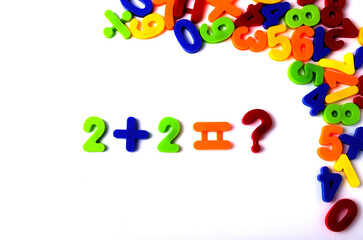 Plastic, magnetic numbers, multicolor. for the board, top view, no people,