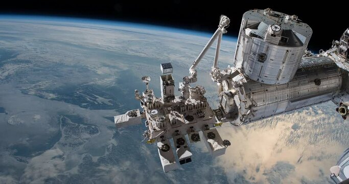 View of International space station on orbit of Earth. ISS. Some elements of the video furnished by NASA