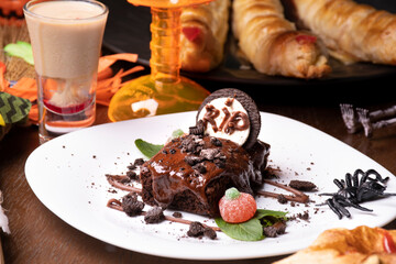 halloween food with tomb chocolate browinede and spider