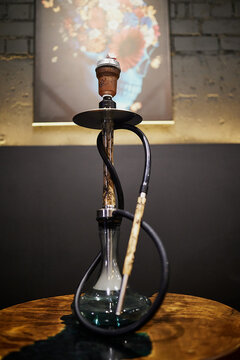 Hookan in front of the wall in bar