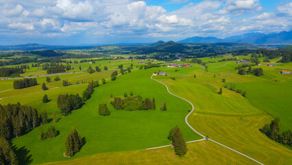 Fototapeta na wymiar Typical landscape in Bavaria in the Allgau district of the German Alps - aerial view