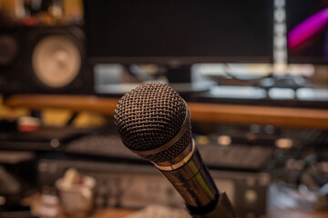 Accessories of music studio with microphones on wooden tables