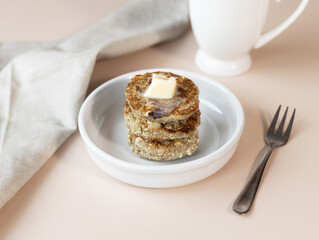 Syrniki, cottage cheese fritters or curd pancakes, made from curd and hemp flour. Low carb Ketogenic diet.