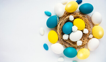 multi colors painted easter eggs in colors flag of ukraine yellow and blue. Happy Easter holiday card	
