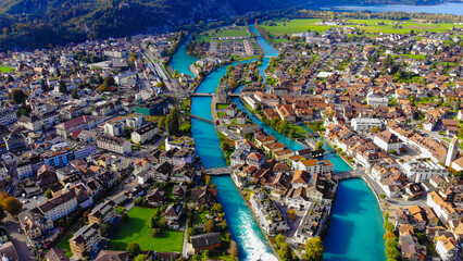 Aerial view over the city of Interlaken in Switzerland - amazing drone footage