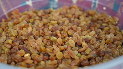 Several Raisins on the Counter Close Up