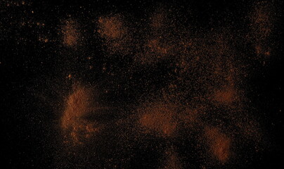 Cinnamon powder isolated black, top view