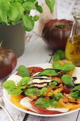 A plate with Italian salad caprese