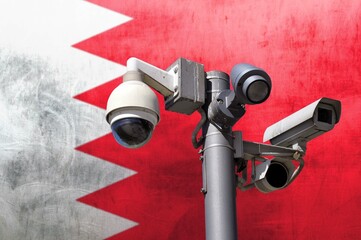 Closed circuit camera Multi-angle CCTV system against the background of the national flag of Bahrain.