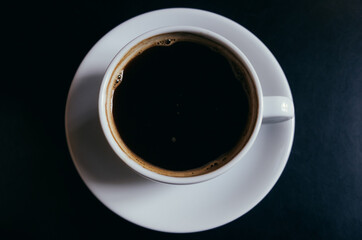 coffee americano in mug, top view, coffee in white mug, selective focus