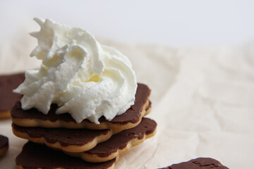 chocolate dessert with cream, chocolate sweets and waffles, cream cake among sweets.