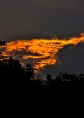 Last rays of the sun visible in the clouds