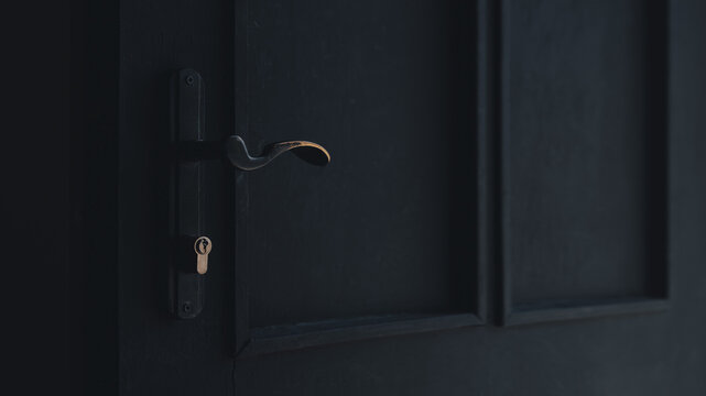 Closeup of a black door handle