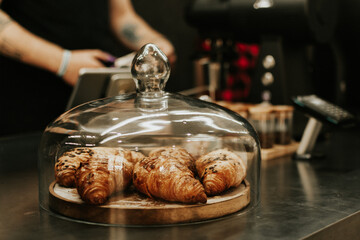 Croissants in glass cover