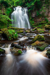 A waterfall drops, Lynn Falls, Caaf Water, Lynn Glen, Dalry, North Ayrshire, Scotland, UK