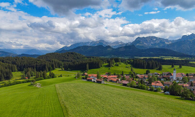 Fototapeta na wymiar Typical Bavarian landscape in the German Alps - Allgau district - aerial view