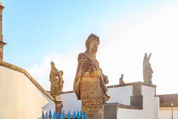 Statue of the prophet sculpted by Aleijadinho in front of the church of the sanctuary of Bom Jesus...