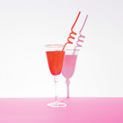 Glass of tasty cold Sangria on white background. Summertime, beach, friends and vacation.