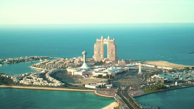Abu Dhabi, United Arab Emirates - February 2022: Aerial view of Marina Mall and Marina Village with Rixos Marina Abu Dhabi hotel