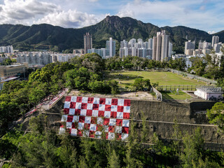 Aerial view of Hong Kong city with the view of the Lion Rock Peak