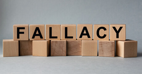 FALLACY, the inscription on wooden cubes on a white background
