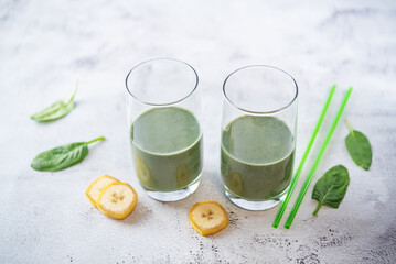 Spinach banana smoothie in a glass