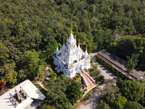 Aerial shot of white Wat Phra Tamo temple in Chiang Mai Province, Thailand.