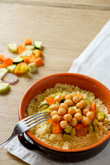 vegan cous cous vith chickpeas and vegetables, traditional dish of north africa