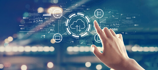 Cloud computing with hand pressing a button on a technology screen
