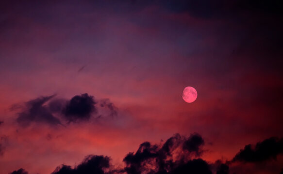 Magnetic Shot Of The Pink Moon On The Pink Sky