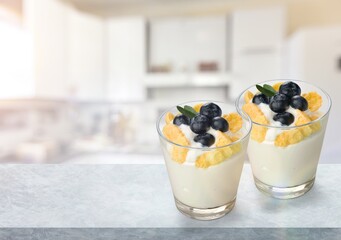 Dessert milkshaike made with fresh fruit, yogurt and granola