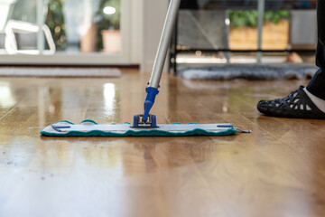 cleaning floor with cleaner