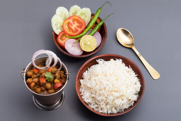 Punjabi Chhole Also Known As Chhola Masala Sabji Amritsari Chole Sabzi Masaledar Chana Chola Or Chickpeas Veg Curry Made Of Chick Peas Onion Tomato And Spices. Served With Boiled Basmati White Rice