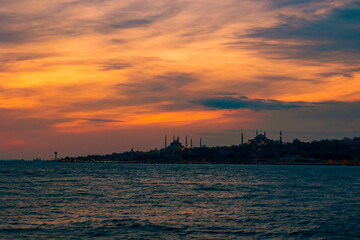 Istanbul view at sunset. Silhouette of Istanbul with dramatic clouds