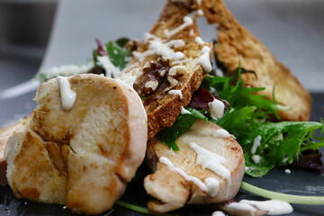 Caesar salad, low-temperature chicken cooked, nuts, caesar sauce.