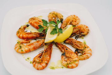 A gourmet portion of grilled prawns