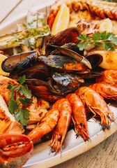A delicious seafood barbecue with mussels, prawns and lobster