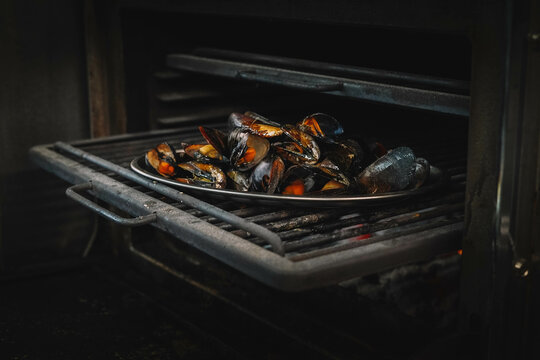 A gourmet portion of grilled Galician mussels