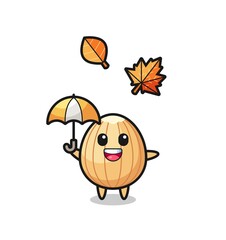 cartoon of the cute almond holding an umbrella in autumn