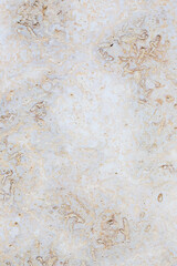 Dolomite texture. Natural rock with beautiful beige patterns on the surface. Polished flat stone. Classic luxury decoration building material. Solid stone background.