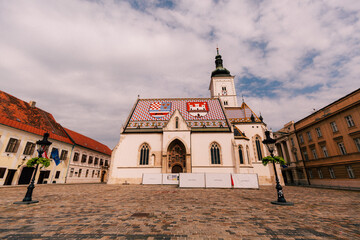 Low angle shot of St. Mark's Church in Zagreb, Croatia © Dimitar Chilov/Wirestock Creators