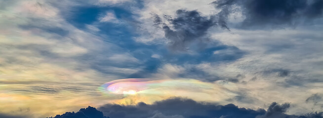 IrIridescent cloud  rainbow in the sky
