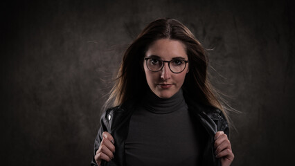 Close-up shot of a young attractive woman in her mid 20s - studio photography
